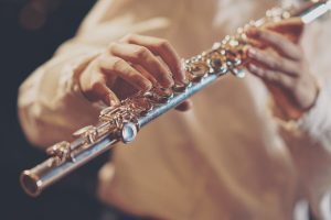 Music Student Playing the Flute