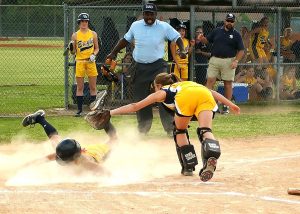 Girls Softball game supported by the baseball booster club