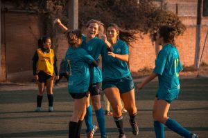 Soccer team celebrating success