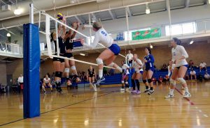 High school volleyball game in progress