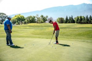 Golf Booster Club supporting time on the course for student and coach