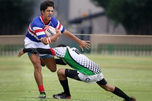 students on the school rugby team supported by the rugby booster club.