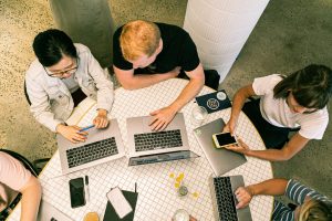 Marketing team working on developing a marketing plan for an organization.