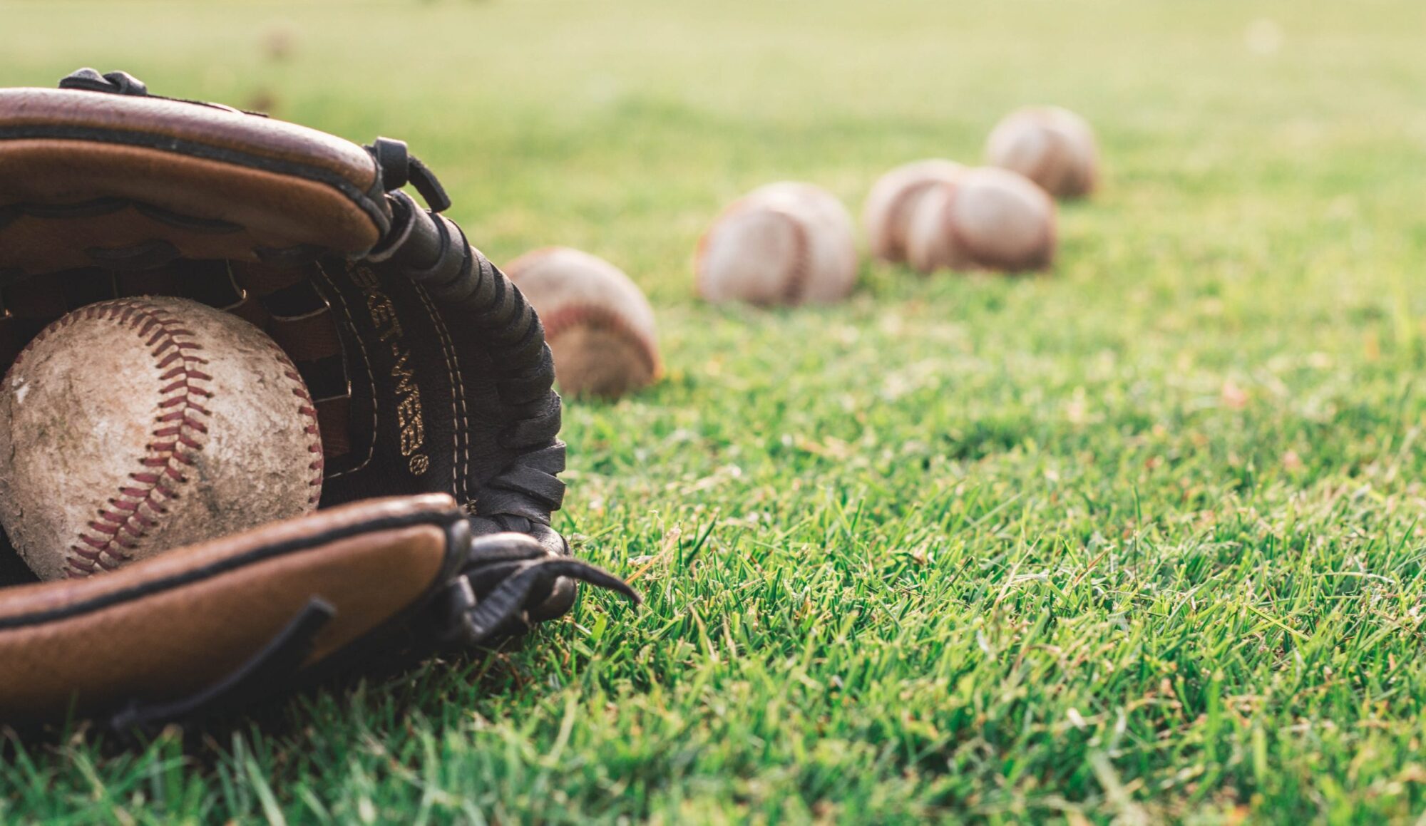 Baseball glove and baseballs