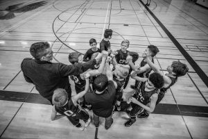 Booster club supporting a youth basketball team.