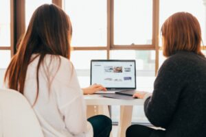 Reviewing social media accounts on a computer.